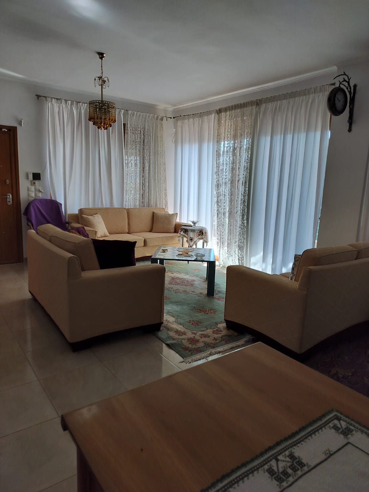 Open-plan living room with comfortable seating at Porto Germeno Villa